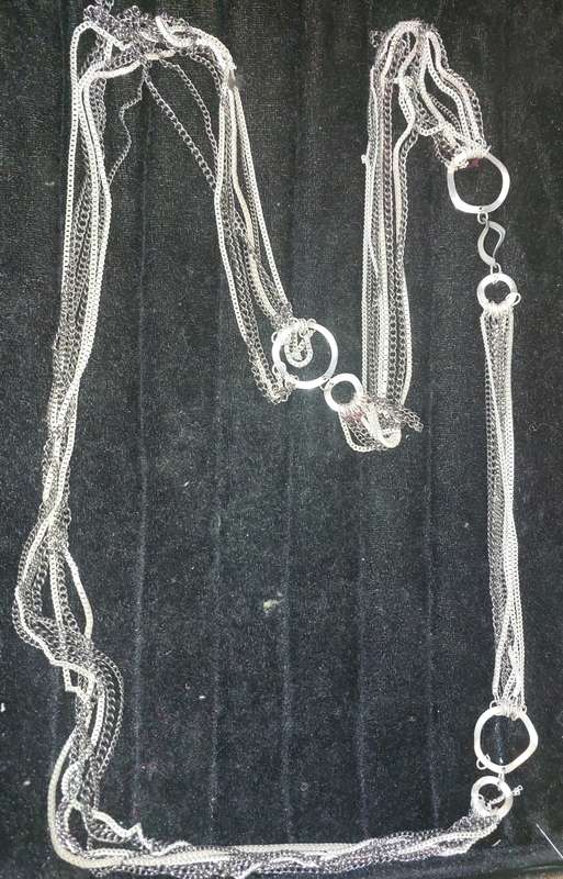 A VINTAGE DESIGNER COLLECTION OF COSTUME NECKLACES SOLD AS IS