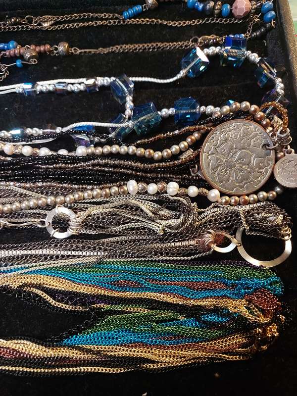 A VINTAGE DESIGNER COLLECTION OF COSTUME NECKLACES SOLD AS IS