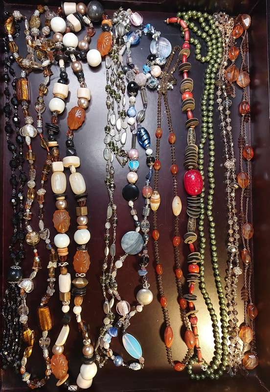 A VINTAGE COLLECTION OF HEAVY BEADED WITH SEMI-PRECIOUS STONES
