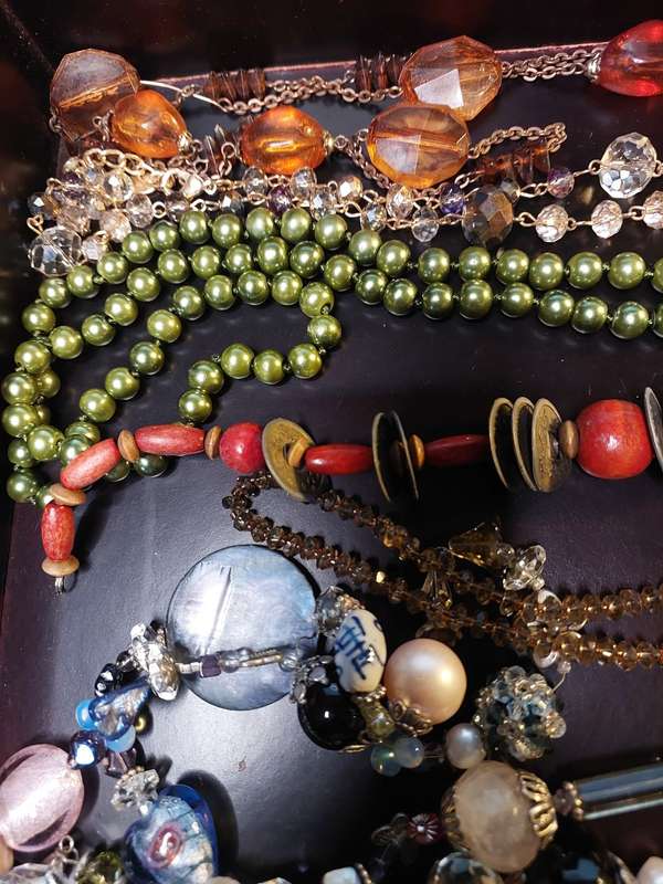 A VINTAGE COLLECTION OF HEAVY BEADED WITH SEMI-PRECIOUS STONES