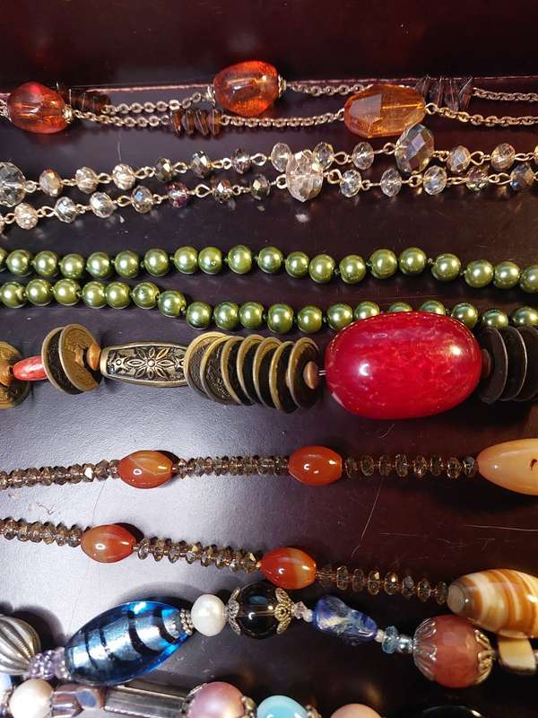 A VINTAGE COLLECTION OF HEAVY BEADED WITH SEMI-PRECIOUS STONES