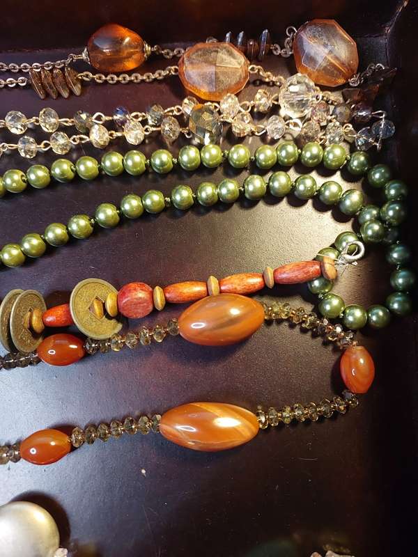 A VINTAGE COLLECTION OF HEAVY BEADED WITH SEMI-PRECIOUS STONES