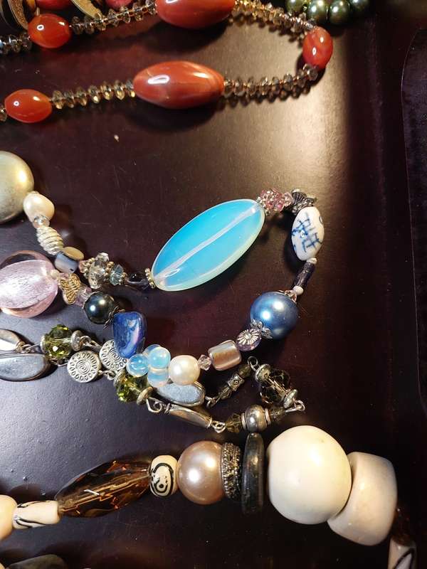 A VINTAGE COLLECTION OF HEAVY BEADED WITH SEMI-PRECIOUS STONES