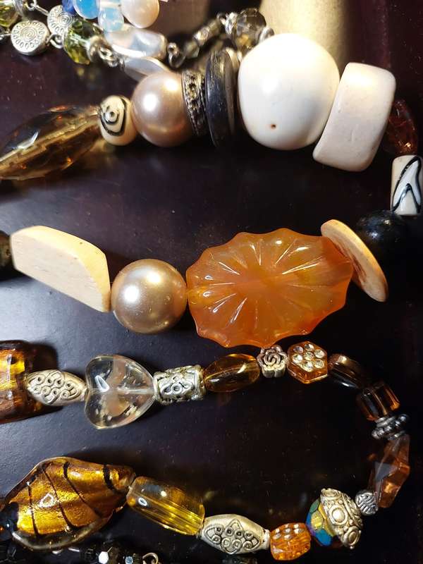 A VINTAGE COLLECTION OF HEAVY BEADED WITH SEMI-PRECIOUS STONES
