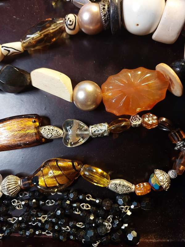 A VINTAGE COLLECTION OF HEAVY BEADED WITH SEMI-PRECIOUS STONES