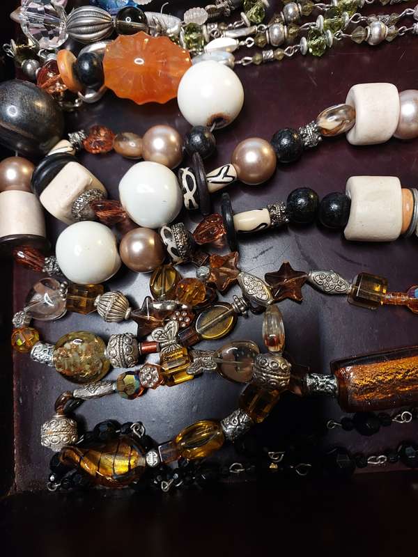 A VINTAGE COLLECTION OF HEAVY BEADED WITH SEMI-PRECIOUS STONES