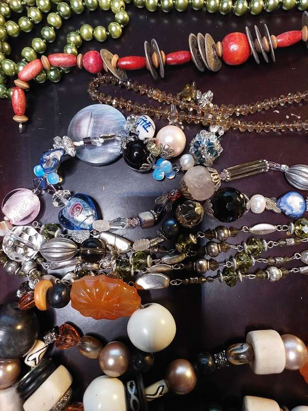 A VINTAGE COLLECTION OF HEAVY BEADED WITH SEMI-PRECIOUS STONES