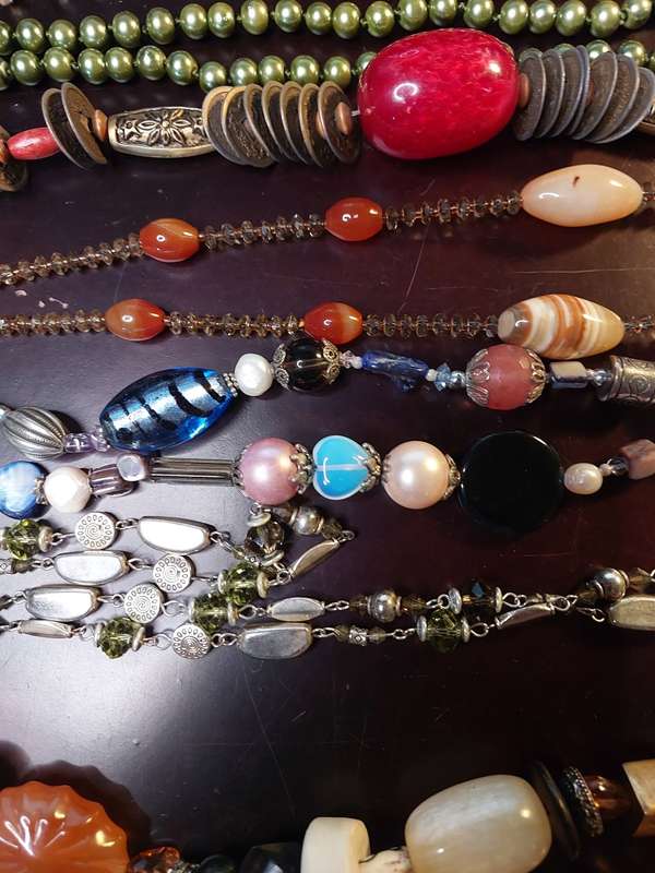 A VINTAGE COLLECTION OF HEAVY BEADED WITH SEMI-PRECIOUS STONES