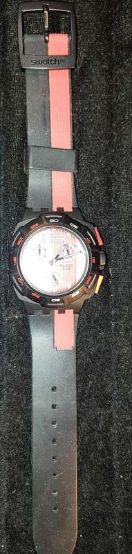 A SWATCH SPORTS WATCH SOLD AS IS