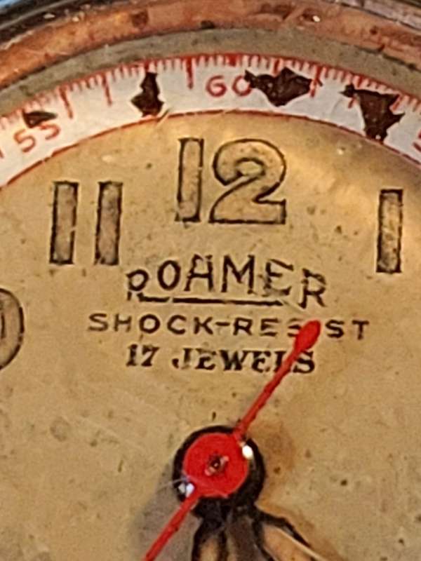 AN ANTIQUE ROAMER MILITARY WATCH BREVETE SWISS MADE 17 JEWELS