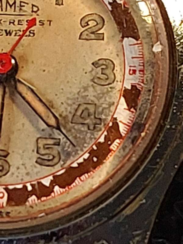 AN ANTIQUE ROAMER MILITARY WATCH BREVETE SWISS MADE 17 JEWELS