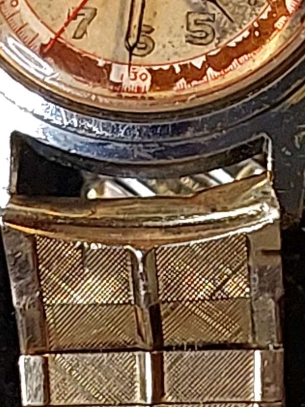 AN ANTIQUE ROAMER MILITARY WATCH BREVETE SWISS MADE 17 JEWELS