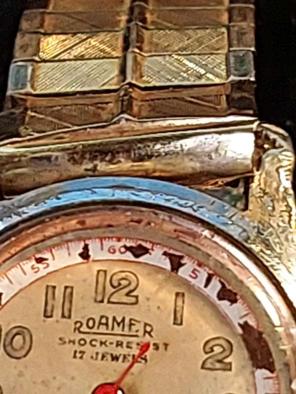 AN ANTIQUE ROAMER MILITARY WATCH BREVETE SWISS MADE 17 JEWELS