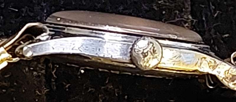 AN ANTIQUE ROAMER MILITARY WATCH BREVETE SWISS MADE 17 JEWELS