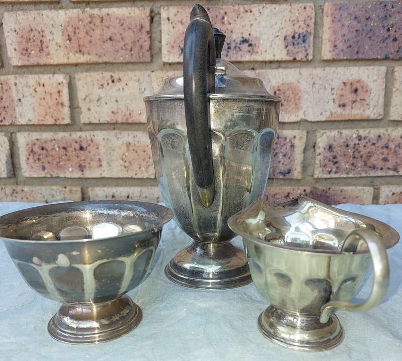 AN ANTIQUE EPNS TEA JUG SET