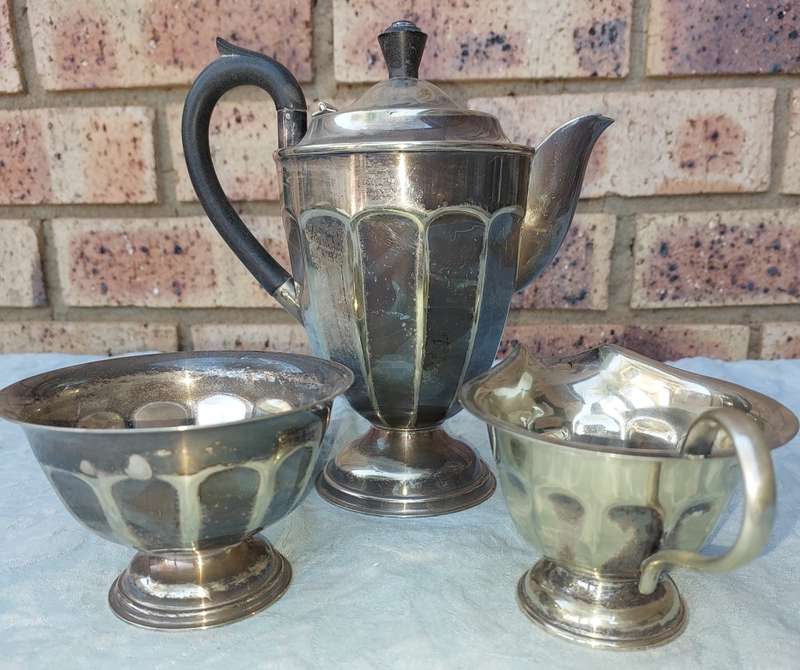 AN ANTIQUE EPNS TEA JUG SET