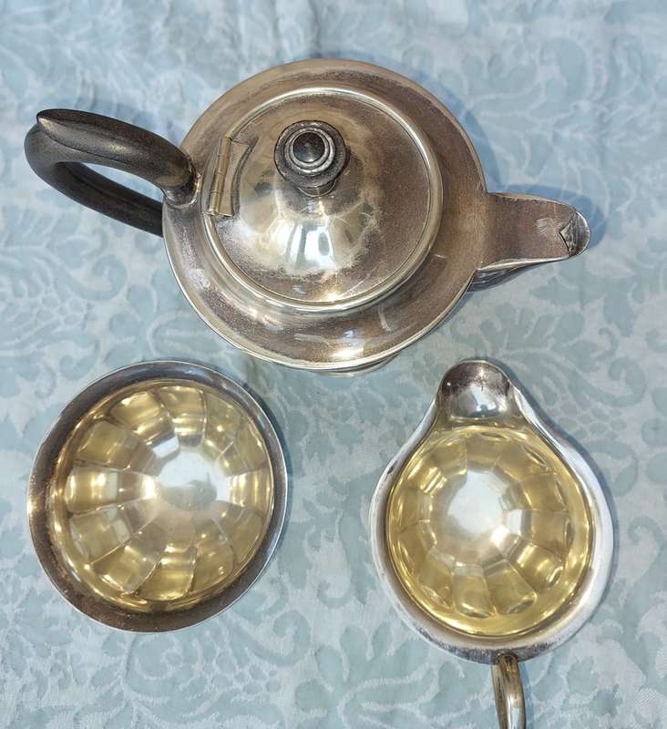AN ANTIQUE EPNS TEA JUG SET