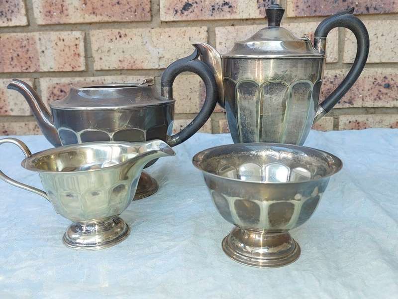 AN ANTIQUE EPNS TEA JUG SET