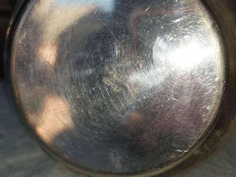 TWO ANTIQUE SILVER PLATED JUGS SOLD AS IS