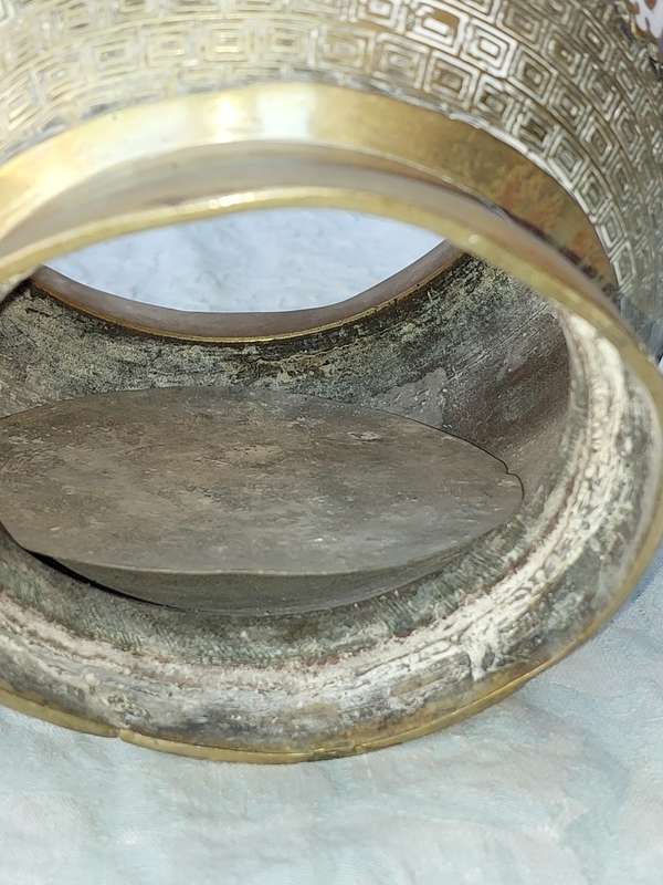 AN ANTIQUE BRASS PLANTER WITH ORNATE DESIGN SOLD AS IS