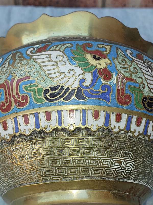 AN ANTIQUE BRASS PLANTER WITH ORNATE DESIGN SOLD AS IS