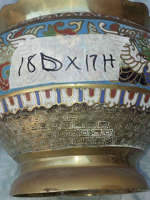 AN ANTIQUE BRASS PLANTER WITH ORNATE DESIGN SOLD AS IS