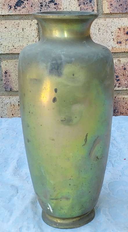 A VINTAGE BRASS VASE NEEDS SOME ATTENTION SOLD AS IS