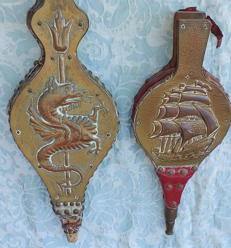 TWO ORNATELY DESIGNED WITH BRASS PLAQUES FIRE BLOWERS