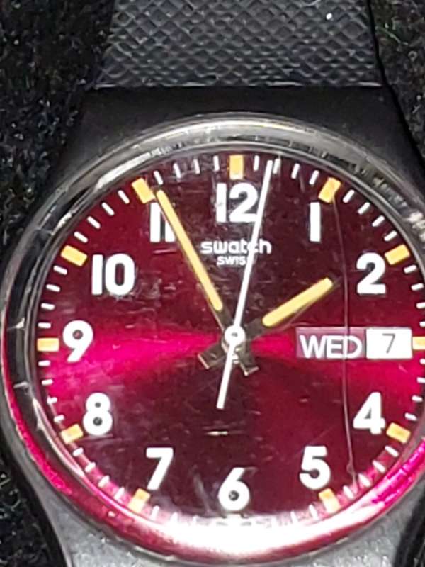 A VINTAGE SWATCH WATCH WITH ITS PAPERWORK AND ORIGINAL BOX SOLD AS IS NOT TESTED