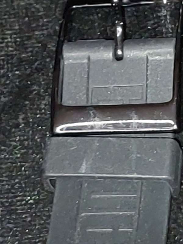 A Puma sports watch take pole position black with a rubber band