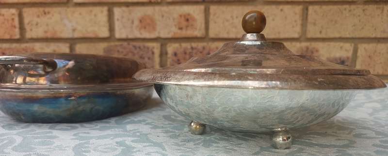 A COLLECTION OF ANTIQUE SILVER PLATED TURINES AND A SERVING TRAY