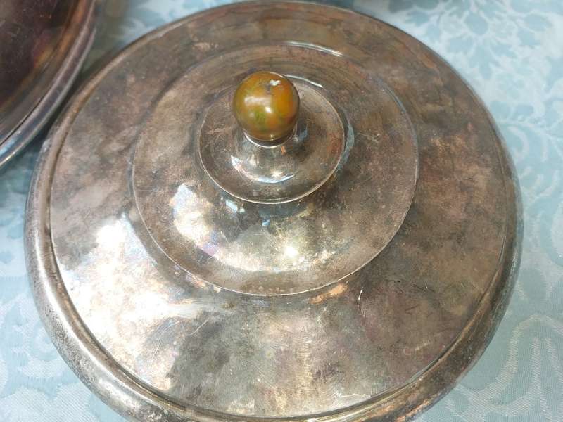 A COLLECTION OF ANTIQUE SILVER PLATED TURINES AND A SERVING TRAY