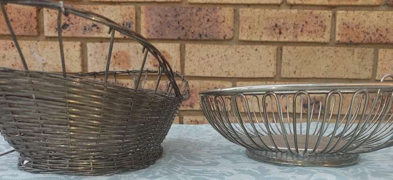 TWO VINTAGE STAINLESS STEEL WIRE MESH FRUIT BASKETS