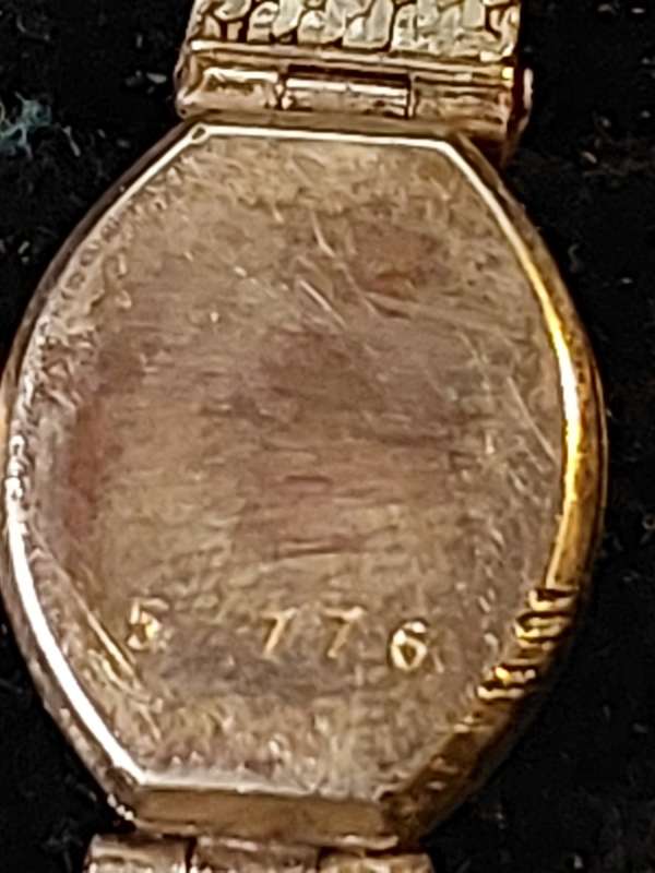 AN ANTIQUE WOMANS BUCKERER WRIST WATCH