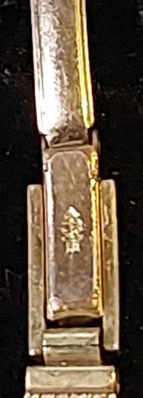 AN ANTIQUE WOMANS BUCKERER WRIST WATCH