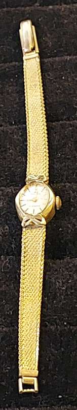 AN ANTIQUE WOMANS BUCKERER WRIST WATCH