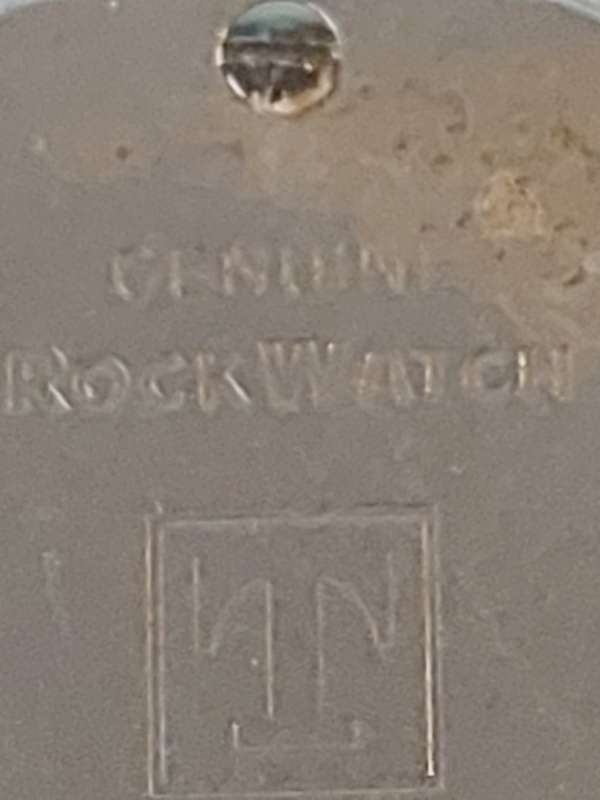 A RARE TISSOT GREY STONE WATCH