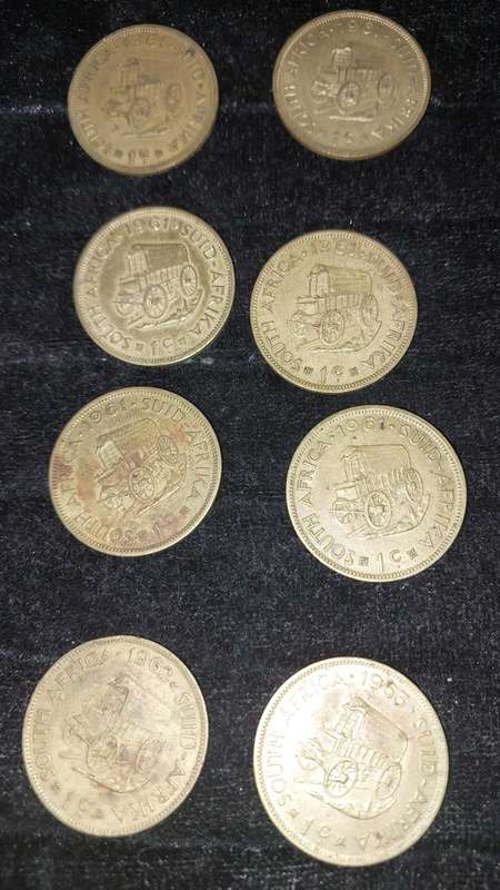 A COLLECTION OF 8 SOUTH AFRICAN 1 CENT COINS
