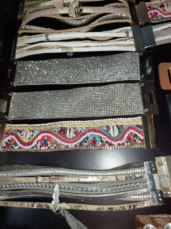 A COLLECTION OF COSTUME FASHION MAGNETIC BRACELET BANDS