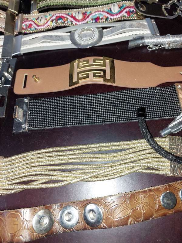 A COLLECTION OF COSTUME FASHION MAGNETIC BRACELET BANDS