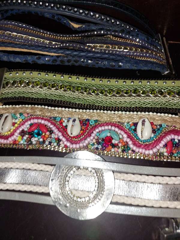 A COLLECTION OF COSTUME FASHION MAGNETIC BRACELET BANDS