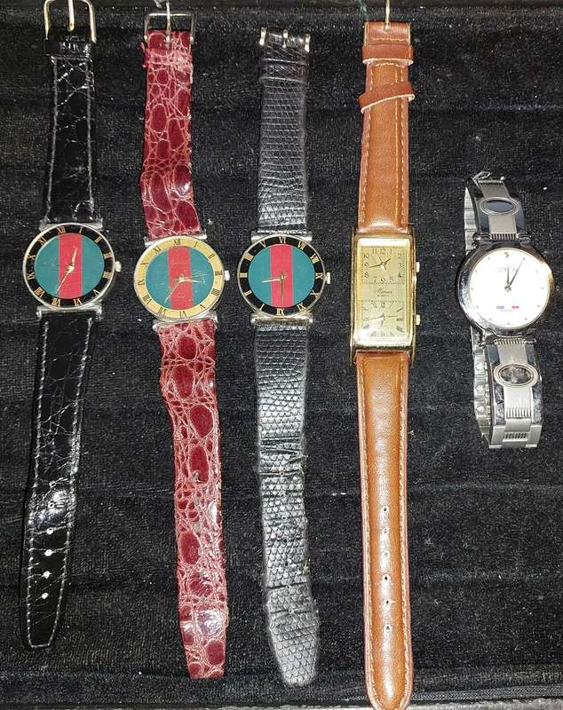 A COLLECTION OF FAMOUS BRANDED WOMANS WATCHES