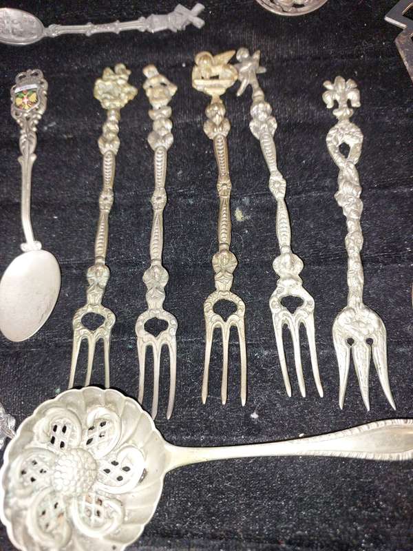 A COLLECTION OF ITALIAN HUGO BELLINI  AND DUTCH FIGURAL CUTLERY
