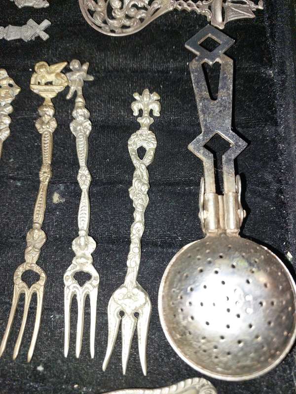 A COLLECTION OF ITALIAN HUGO BELLINI  AND DUTCH FIGURAL CUTLERY