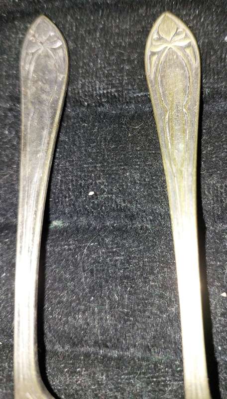 A VINTAGE SET TEASPOONS SOLD AS IS