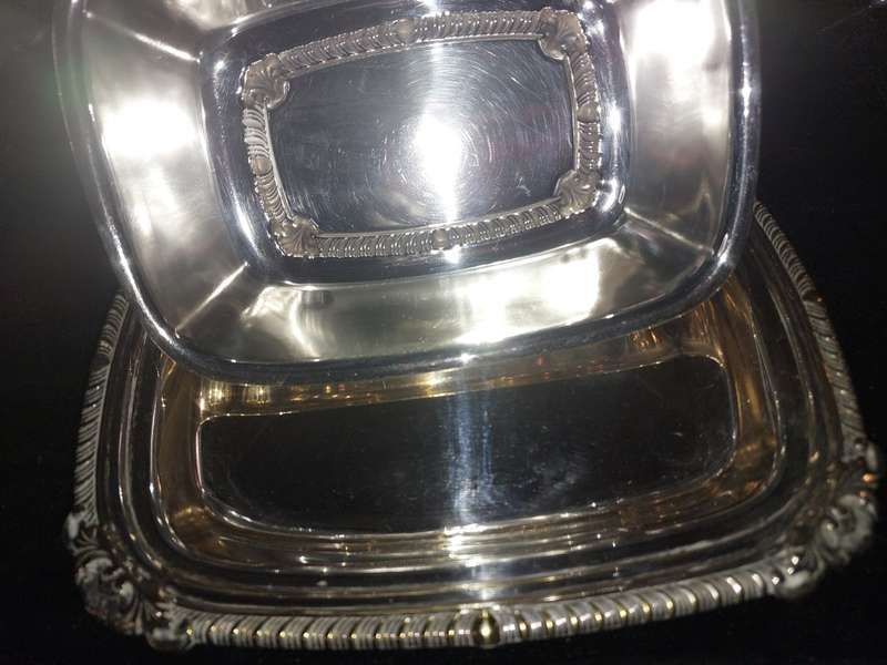 A VINTAGE EPNS BUTTER DISH SOLD AS IS