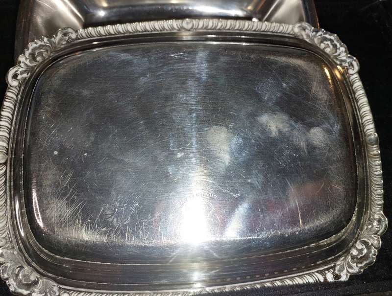A VINTAGE EPNS BUTTER DISH SOLD AS IS