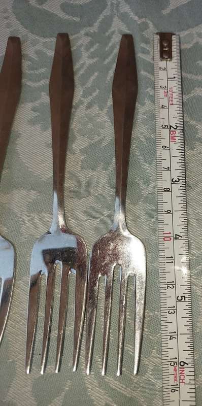 A NEAT SET OF (6) 18-8 STAINLESS STEEL FORKS
