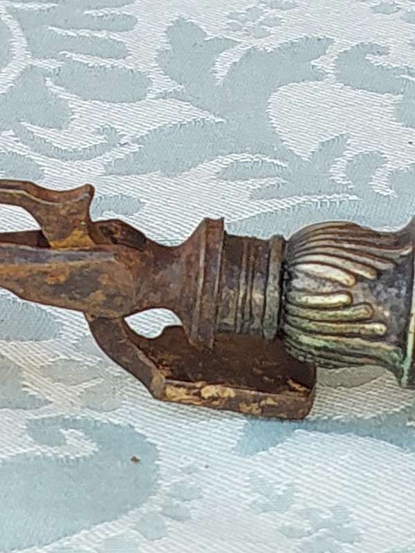 AN ANTIQUE ROAST FORK SOLD AS IS