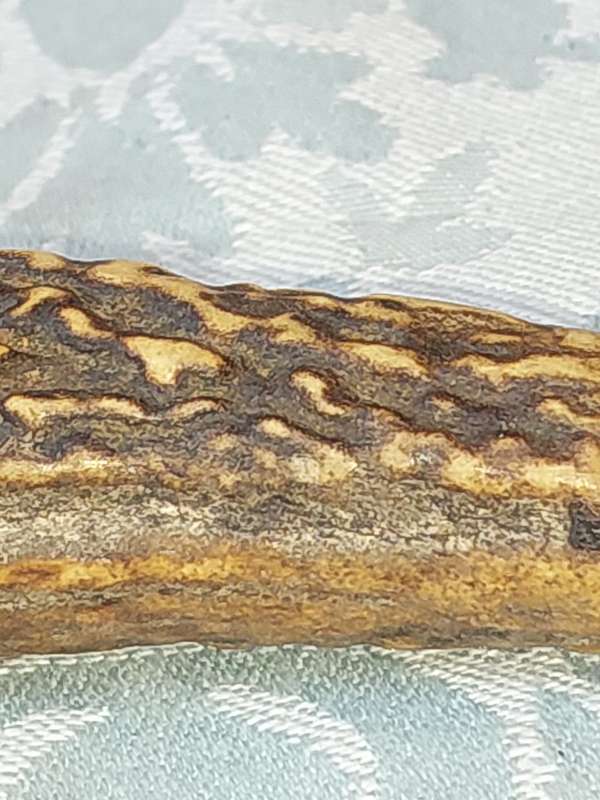 AN ANTIQUE ROAST FORK SOLD AS IS